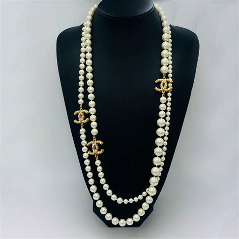 chanel cross necklace|chanel pearl long strand necklaces.